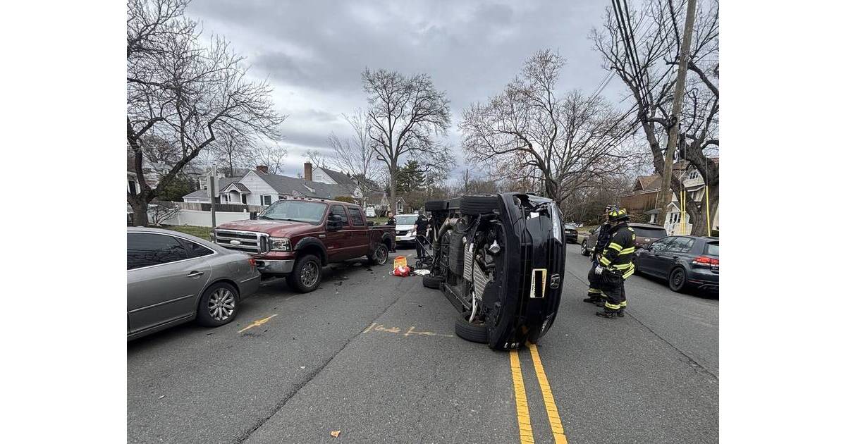 Car Rolls Onto its Side After Crashing Into Parked Vehicles on East ...