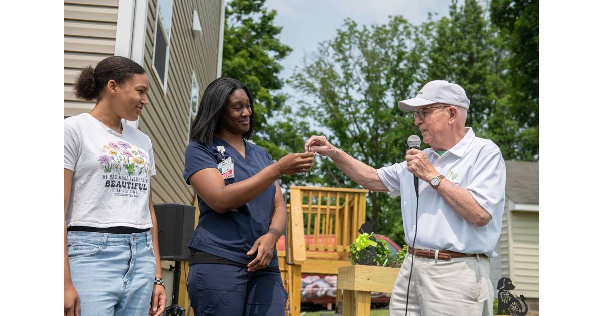 Hamilton Family to Their New Home Built by Habitat for