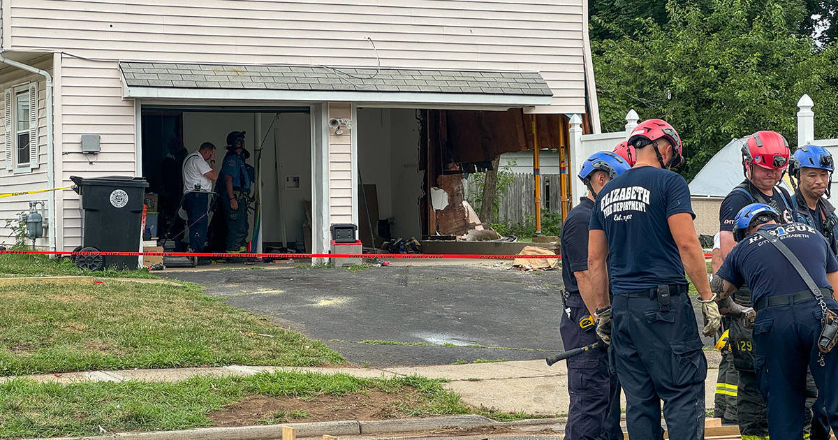 Car Crashes into Plainfield Home as Firefighters Work to Stabilize