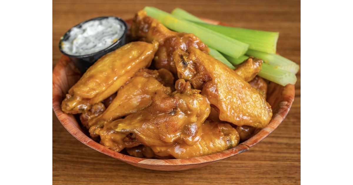 Wings Plus Tradition of Good Food, Spirits, and History Serving Coral