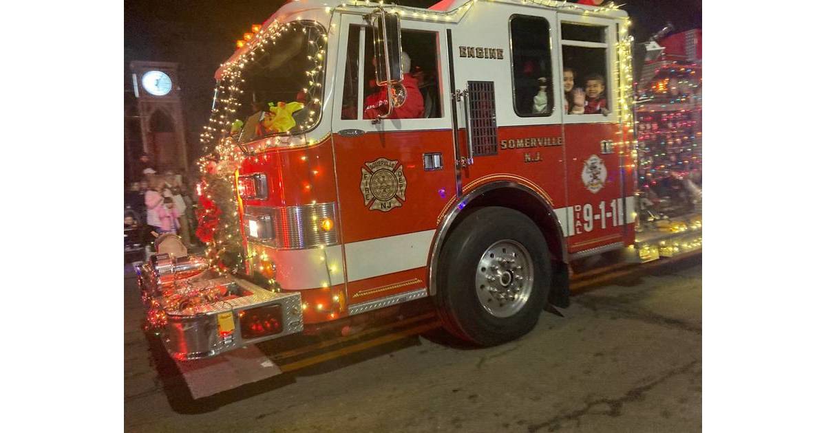 Firefighters Light Up the Town, Escort Santa Claus Down Main Street and
