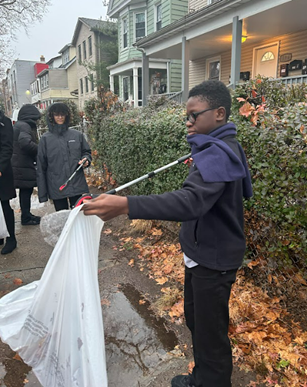 A child holding a plastic bag AI-generated content may be incorrect.