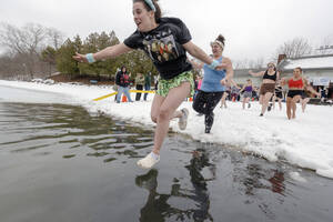 Carousel image 53bf3e562a2f30f9366d 10 26news front page photo oakdale polar plunge 16