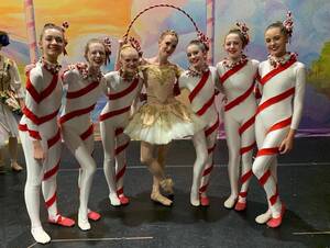 Carousel image 3af00050b7f9eeccdaac 11 28 25 rebecca kid as candy cane