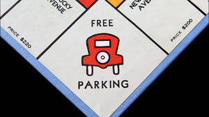 Carousel image 52a95f1fefae6f521e61 12152025 free parking monopoly shutterstock 249272293