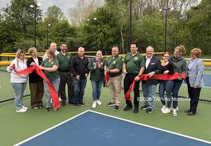 Carousel image 2a79e1efec4e76e7d163 1 pickleball courts ribbon cutting hw