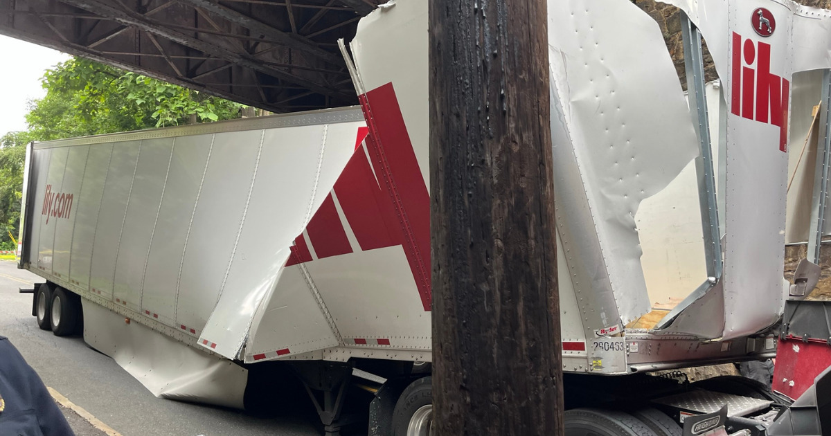Truck vs. Overpass Truck accident causes street closures in downtown