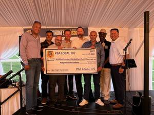 Carousel image deda09b9d2f2a40a9315 2024 nj pba 102 presented 50k check to njspba from jarret cooke