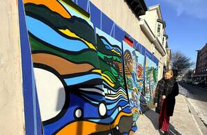 Carousel image 33e1667ea06dd88e9611 2 20 26 sprng st mural alissa outside 