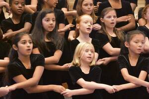 Carousel image fa3b308f9b7822942945 3 19 26 girlchoir holding hands