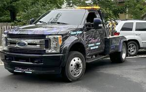 Carousel image 4cc57674b7ebf2bade84 6 11 25 tow truck