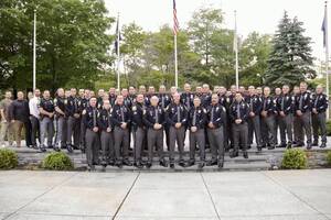 Carousel image 9e0573 tafford ownshi olice fficer total photo