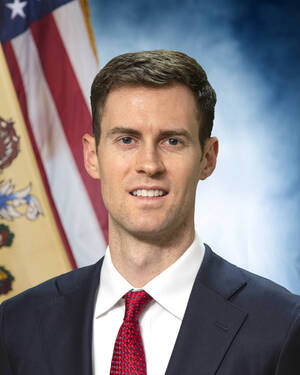 Carousel image 39cc29a05fe3c9a20fcd ag office headshot