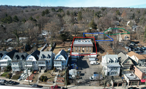 Carousel image e0bd61c8d730993d1de0 all of the surrounding buildings conform to the zoning ordinance at 2.5 stories with a rear yard set back of over 30 feet and have a consistent architectural style 