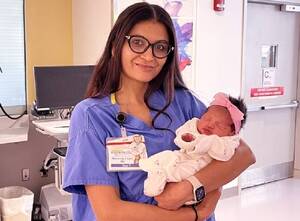 Carousel image c33423ba99c4650bbf8d a nurse   baby