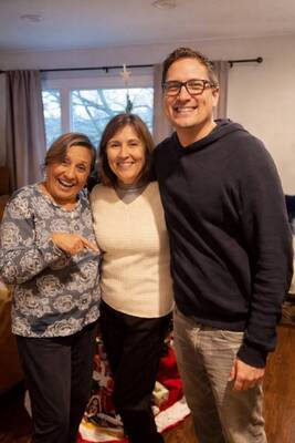 Carousel image b76c956f0dabc02d5932 at center is susana guarino with her sister maria and her nephew christopher