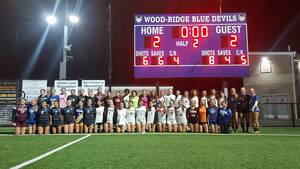 Carousel image 6733718431e4f185cf67 both teams after the game