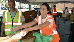 Carousel image e2826240c909195f35d5 boca helping hands giving food out