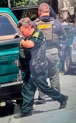 Carousel image 618f823e93b9f9baaa00 bso swat deputies on bay drive in pompano beach