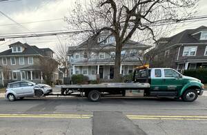 Carousel image 197db6f5b53ff7d147d2 car and tow truck