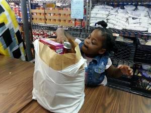 Carousel_image_88f466c30c0b7ee9c82d_child_in_pantry__2_