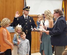 Carousel image ad54ab00dc5e823b8fec chief joe rooney swearing in captain