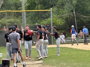 Carousel image cd9272b4b6aa42ab5158 chase fischer being congradulated by his teamates after hitting his division leading seventh home run.
