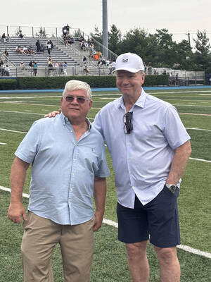 Carousel image dc7da25f09708ae75630 coach hubert   phil simms