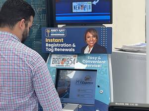 Carousel image 8283169a07fb2fe036f0 customer at kiosk