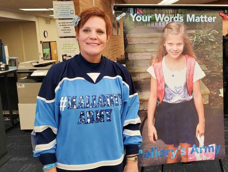 Dianne Grossman, founder of anti-bullying advocacy group, Mallory's Army, with a photo of her daughter, Mallory