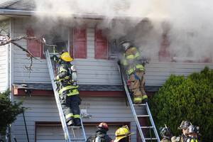 Carousel image 137d750a6eb08e1cbf41 division ave fire 1 cr brianna nagy and shane biskey