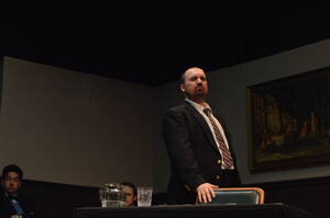 Carousel image de37dd ristan e iore taking the stage to perform as the district attorney named lint