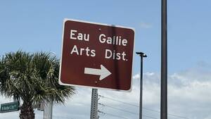 Carousel image 052a6fcc619ea3029e01 eau gallie arts district with arrow sign