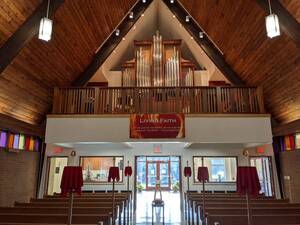 Carousel image dbbe610c66339cb8f88a faith s pipe organ in the loft