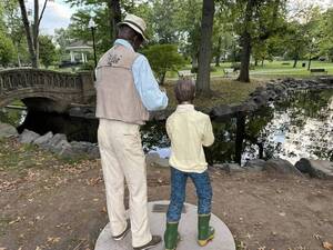 Carousel image 408ae5 graffiti on eward ohnson statue