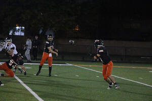 Carousel image 02d267e79ec4ffab6654 hasbrouck heights qb daniel amendola passes to napolitano