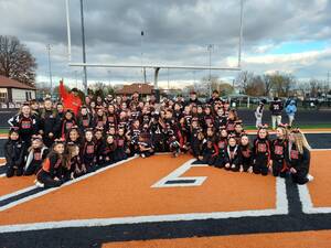 Carousel image 240768e048ed942038e2 hasbrouck heights football and cheer team with trophy