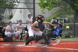 Carousel image 6f03fe2103eccd1131d9 hasbrouck heights catcher giiulana terranova protects the plate as wood ridge alana ambrosio slides home