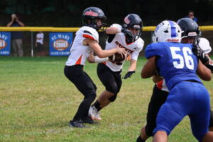 Carousel image 81c0f94cee3389dc0af7 hasbrouck heights qb nico nipitella hands off to nick haines
