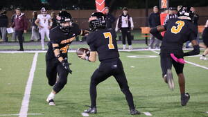 Carousel image daee976e114e9ff935ca hasbrouck heights qb nico nipitella hands off to running back michael napolitano