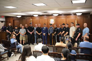 Carousel image ec312e4e518dd65b506e hasbrouck heights pd officers with newest member andri barrios