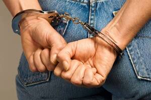 Carousel image f3807e an in andcuffs