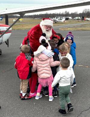 Carousel image 18a8ba4b933117f6cad2 hillspixflyin2024santahugsmoney