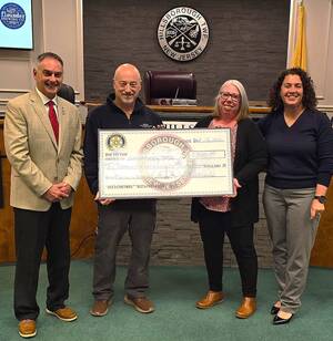 Carousel image 38d38ba989d37c09ef24 hillspixrotaryvictorytowncheckpresentation