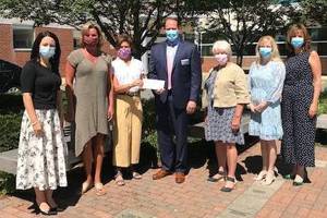 Carousel_image_16c7df1f1cdf2403b24c_hmc_and_nmc-photo_op_food_shed_donation_-_september_2020