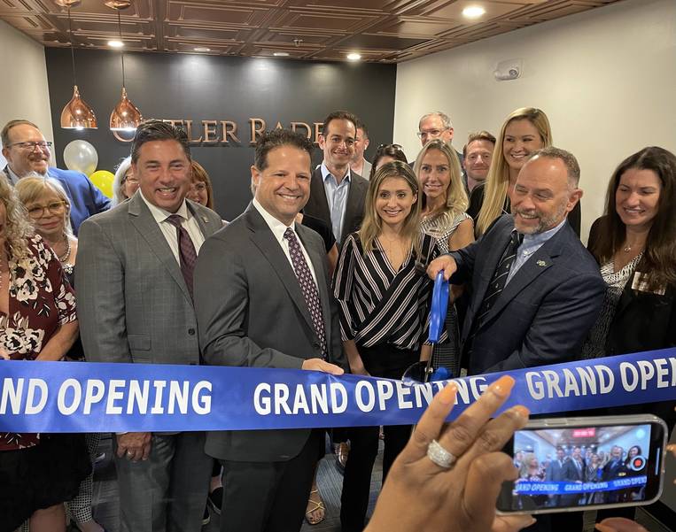 There was a ribbon-cutting ceremony on Thursday at the new office of the Cutler Rader law firm in Coral Springs. 
