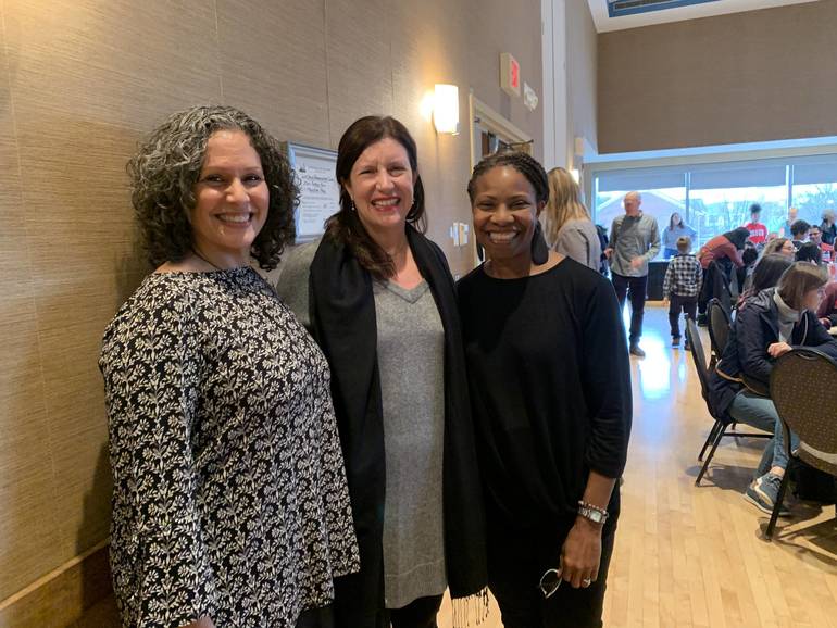 Children And Parents Decorate Luminaries In Preparation Of Martin