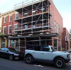 Carousel image f3d0bb west state street doylestown loose bricks crumbling facade