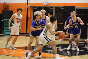 Carousel image 4a53ed0d30f984a000ea jameson juan and connor meehan hold off the pawling attack.