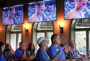 Carousel image cfe0f12d709ff94877bf jim lambert and dr. jim reagan watch union catholic track legend sydney mclaughlin levrone race in the olympic semifinal for the 400m hurdles in paris.